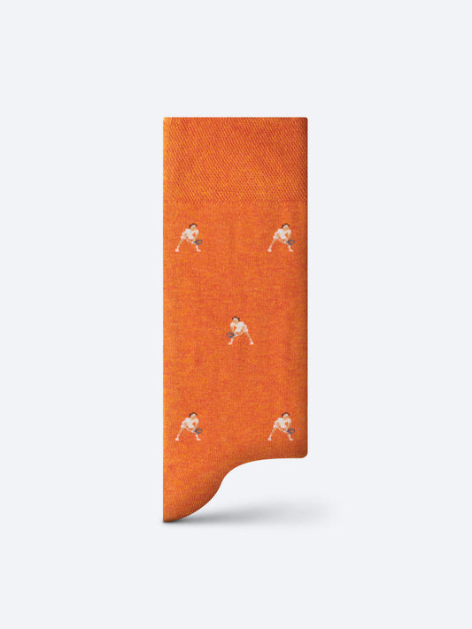 Orange unisex sock with white tennis player pattern
